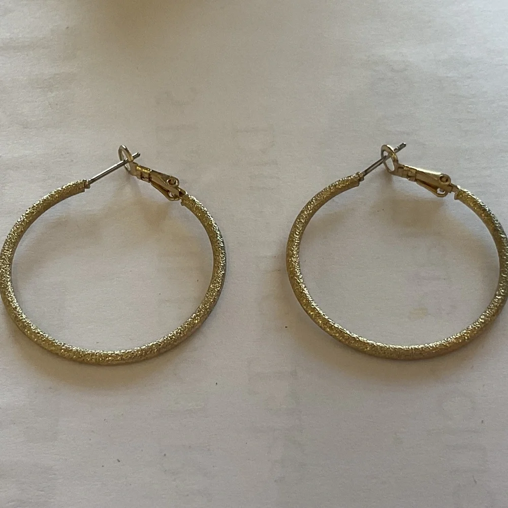 None hoop earrings